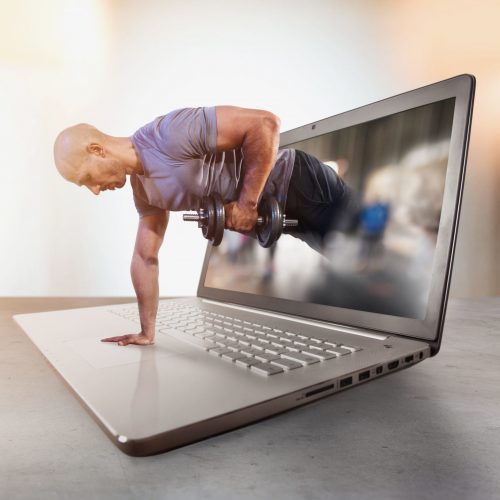 Personal,Trainer,Does,Gym,Lesson,Through,Internet,And,Laptop
